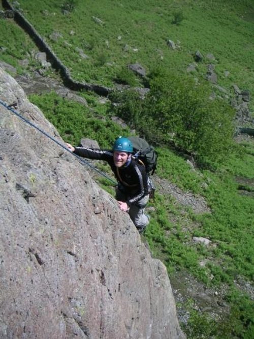 50a Pete-enjoying-the-rough-pocketed-arete-on-Route-1-Upper-Scout-Crag